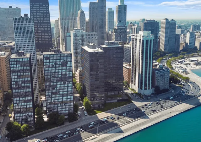 a view of a city with tall buildings