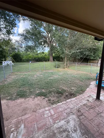 a view of a park with swings