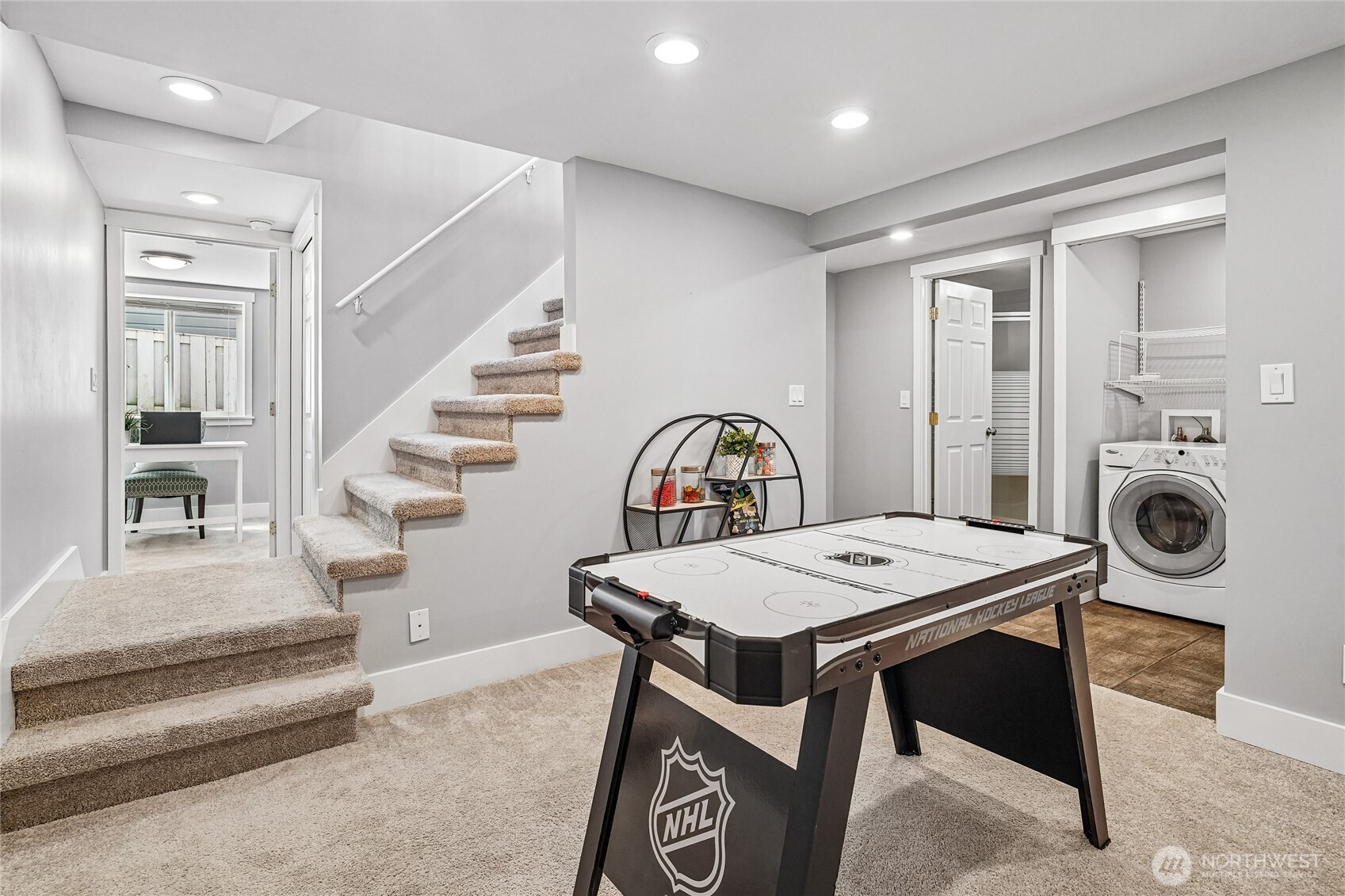 7313 25th Avenue Northwest Seattle, WA 98117 - Photo 20 of 40 a view of a hallway with seating area and livingroom view