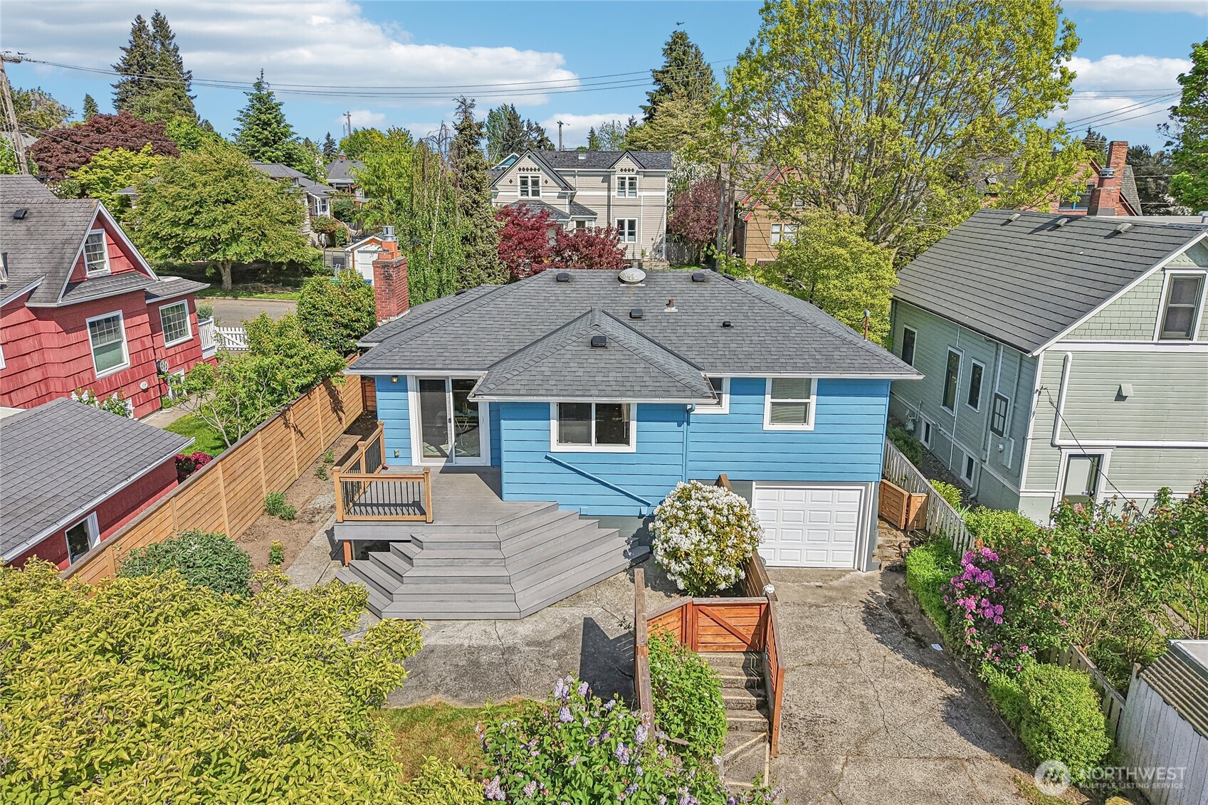 7313 25th Avenue Northwest Seattle, WA 98117 - Photo 34 of 40 aerial view of a house with a yard