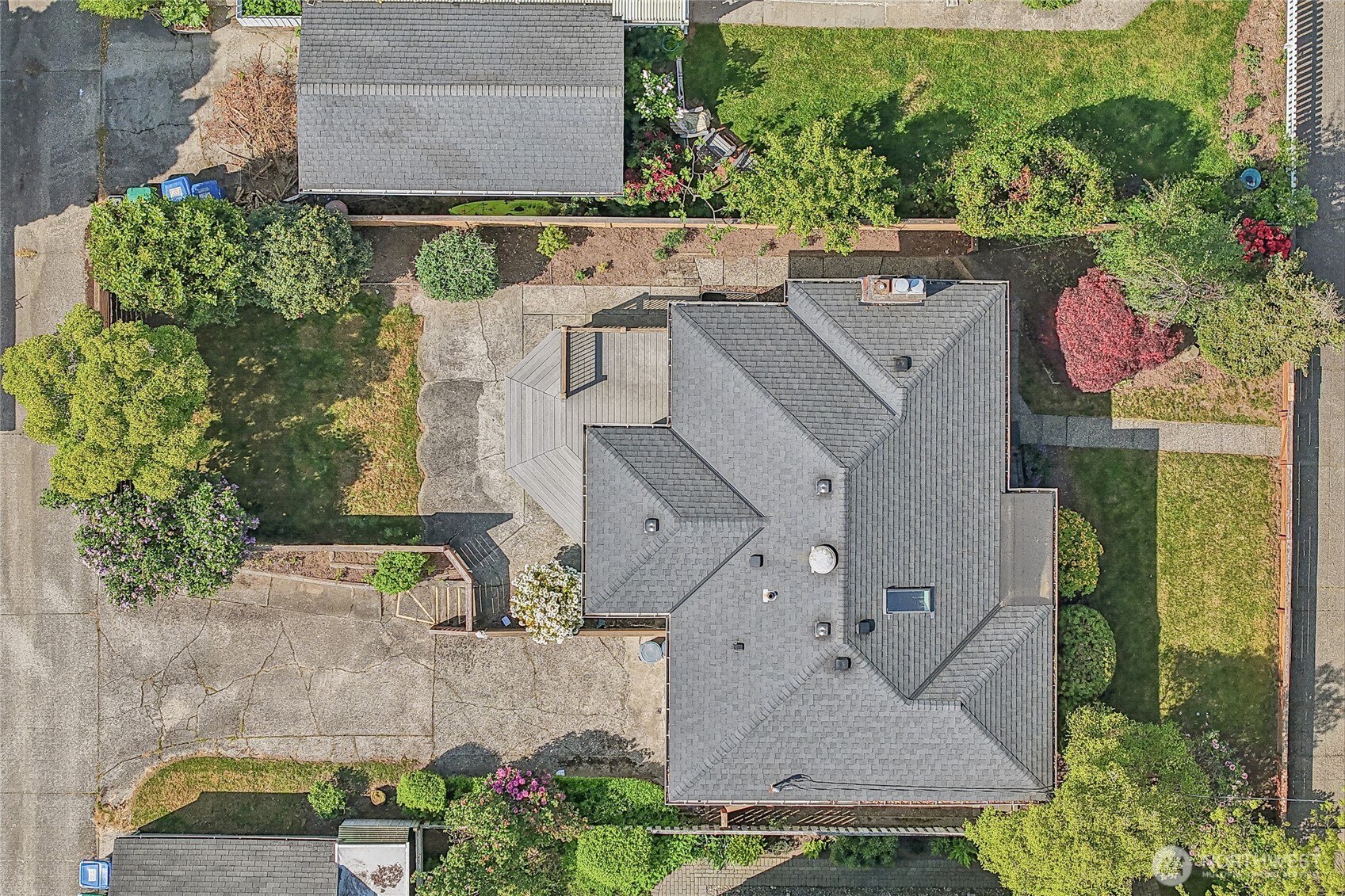 7313 25th Avenue Northwest Seattle, WA 98117 - Photo 36 of 40 an aerial view of a house with a garden