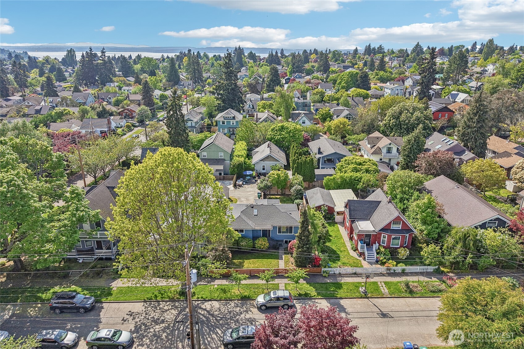 7313 25th Avenue Northwest Seattle, WA 98117 - Photo 38 of 40 an aerial view of residential houses with outdoor space and street view