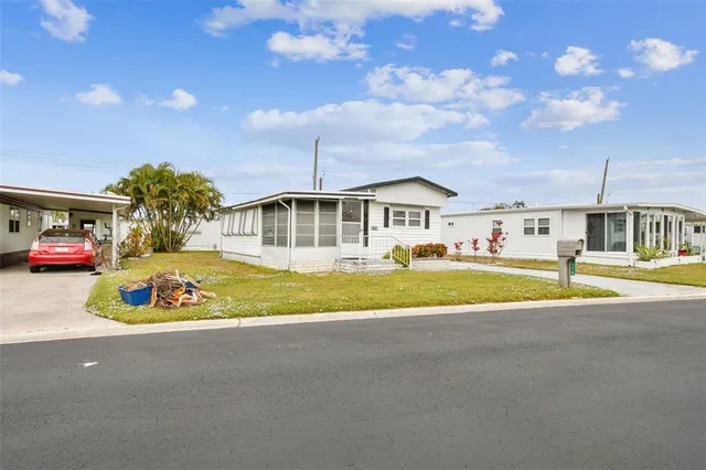 a view of pool with brick walls