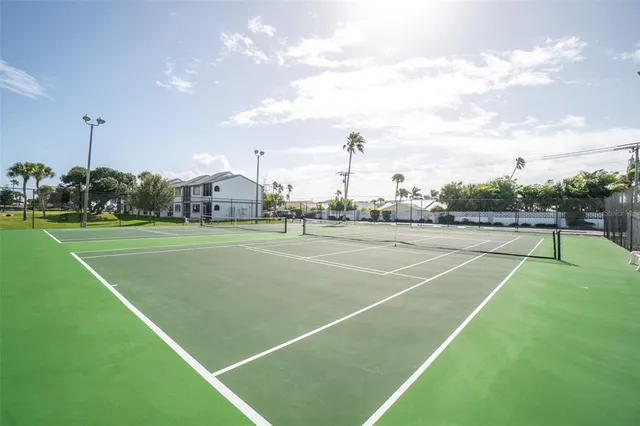 a view of balcony and yard