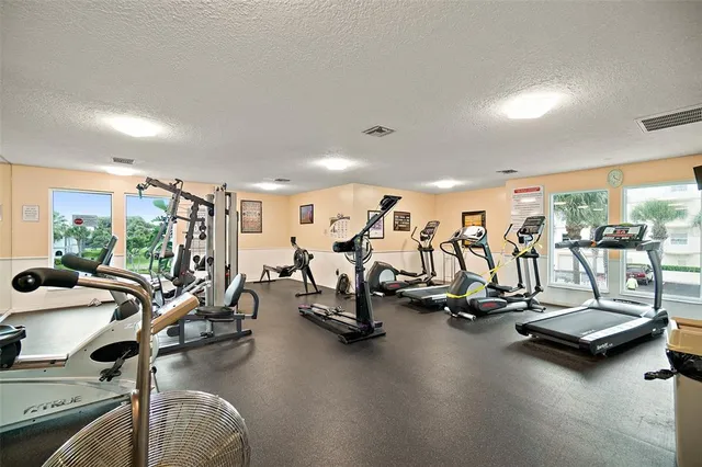 an aerial view of a house with a ocean view