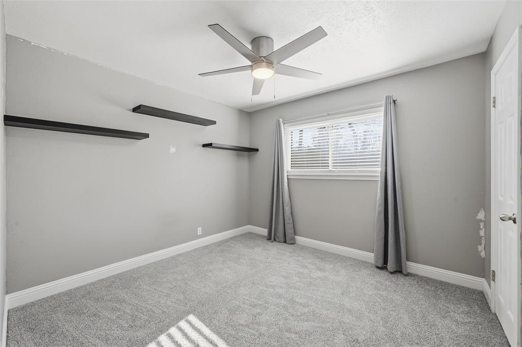 1164 Valley View Drive Hurst, TX 76053 - Photo 12 of 21 Home boast 2 nice size secondary bedrooms with ample closet space.