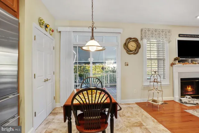 a view of a livingroom with furniture and a fireplace