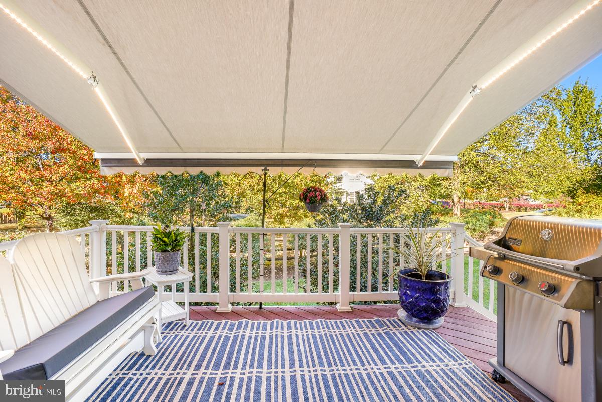 7606 Vulpe Court Odenton, MD 21113 - Photo 19 of 45 a view of a balcony with wooden floor