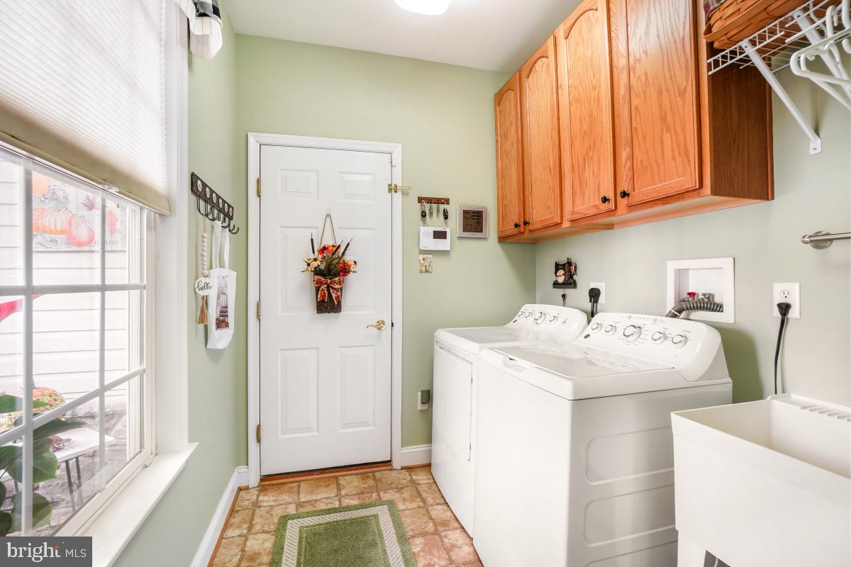 7606 Vulpe Court Odenton, MD 21113 - Photo 22 of 45 a utility room with dryer and washer