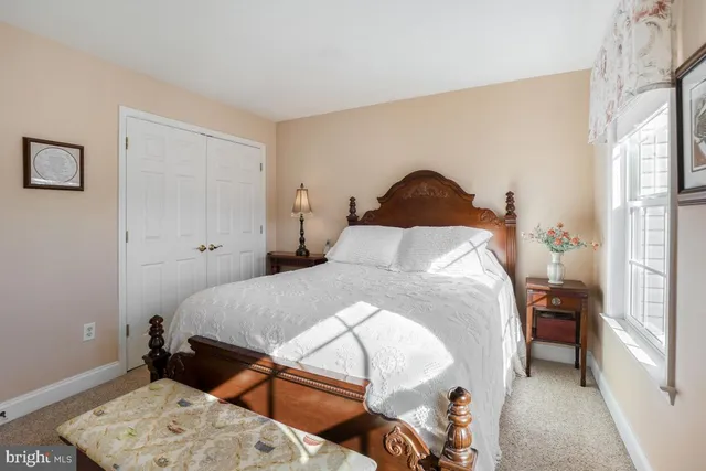 a bathroom with a sink toilet and a mirror