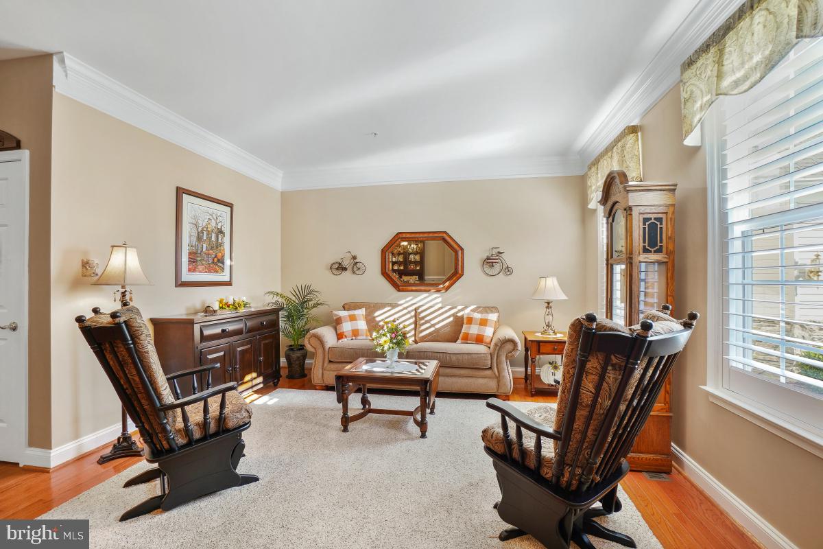 7606 Vulpe Court Odenton, MD 21113 - Photo 4 of 45 a living room with furniture and a window