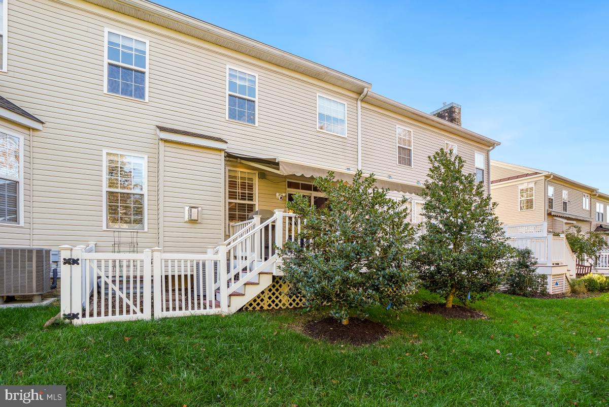 7606 Vulpe Court Odenton, MD 21113 - Photo 45 of 45 a front view of a house with a garden