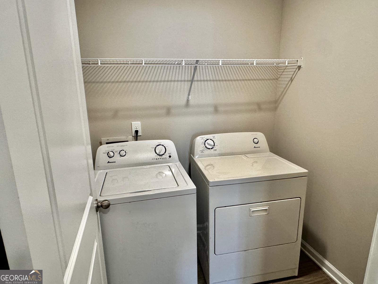 1397 Ben Park Way Grayson, GA 30017 - Photo 15 of 17 a utility room with dryer and washer