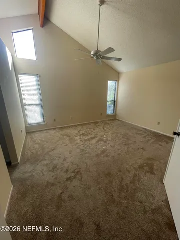 a view of a window in an empty room