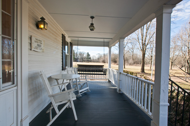 385 Old Sutton Road Barrington Hills, IL 60010 - Photo 2 of 25 a view of a room with wooden floor and furniture