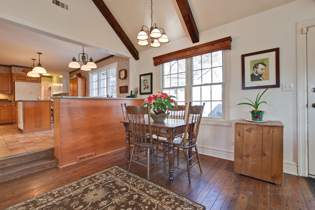 385 Old Sutton Road Barrington Hills, IL 60010 - Photo 11 of 25 a view of a dining room with furniture and wooden floor