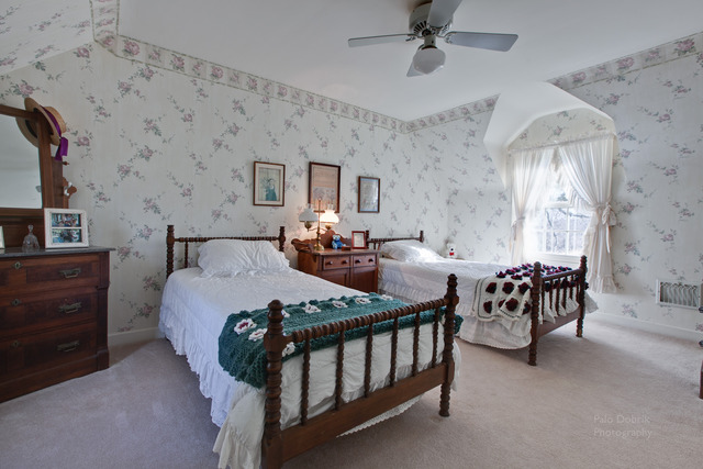 385 Old Sutton Road Barrington Hills, IL 60010 - Photo 14 of 25 a bedroom with bed and window