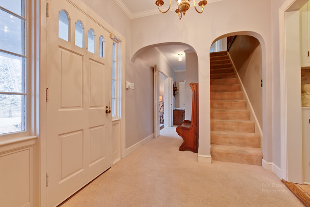 385 Old Sutton Road Barrington Hills, IL 60010 - Photo 16 of 25 wooden floor in an entryway with a staircase