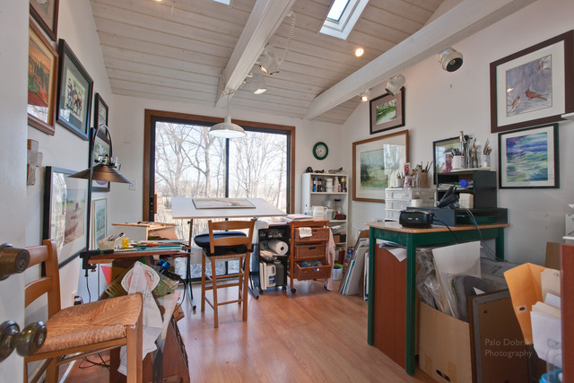 385 Old Sutton Road Barrington Hills, IL 60010 - Photo 17 of 25 a view of a dining room with furniture window and wooden floor