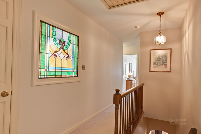 385 Old Sutton Road Barrington Hills, IL 60010 - Photo 21 of 25 a view of a hallway with windows