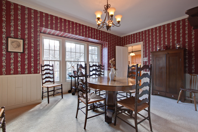 385 Old Sutton Road Barrington Hills, IL 60010 - Photo 8 of 25 a view of a dining room with furniture and chandelier
