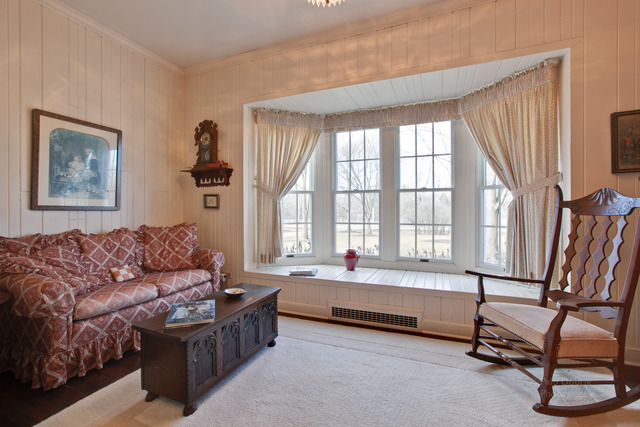 385 Old Sutton Road Barrington Hills, IL 60010 - Photo 9 of 25 a living room with furniture and a window