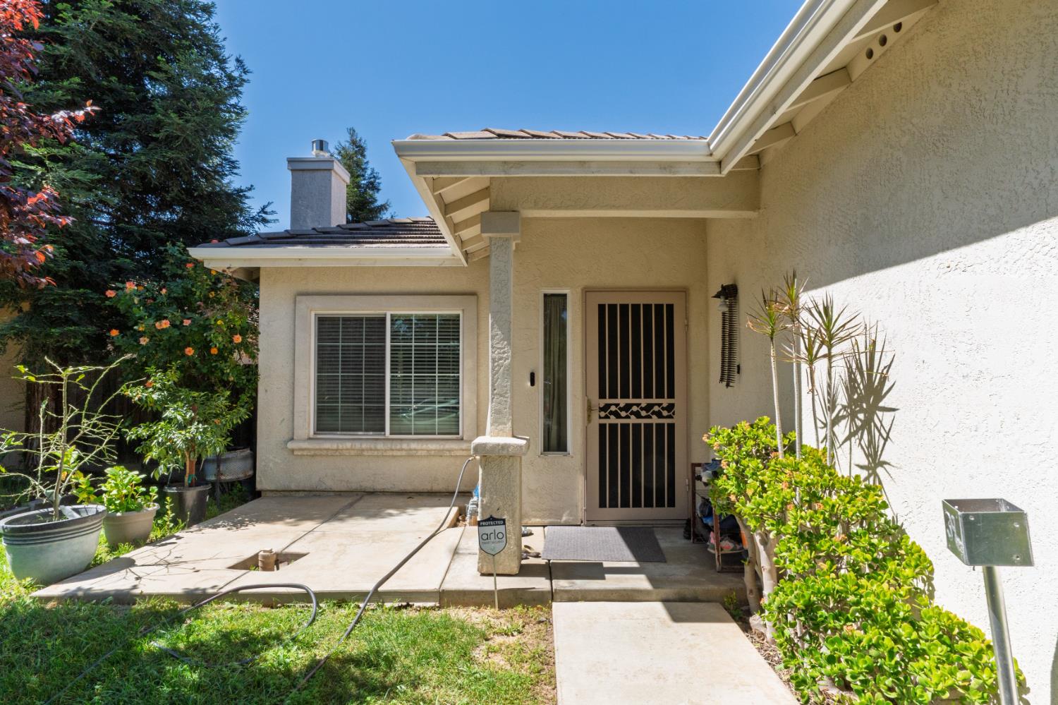 a front view of a house with a porch