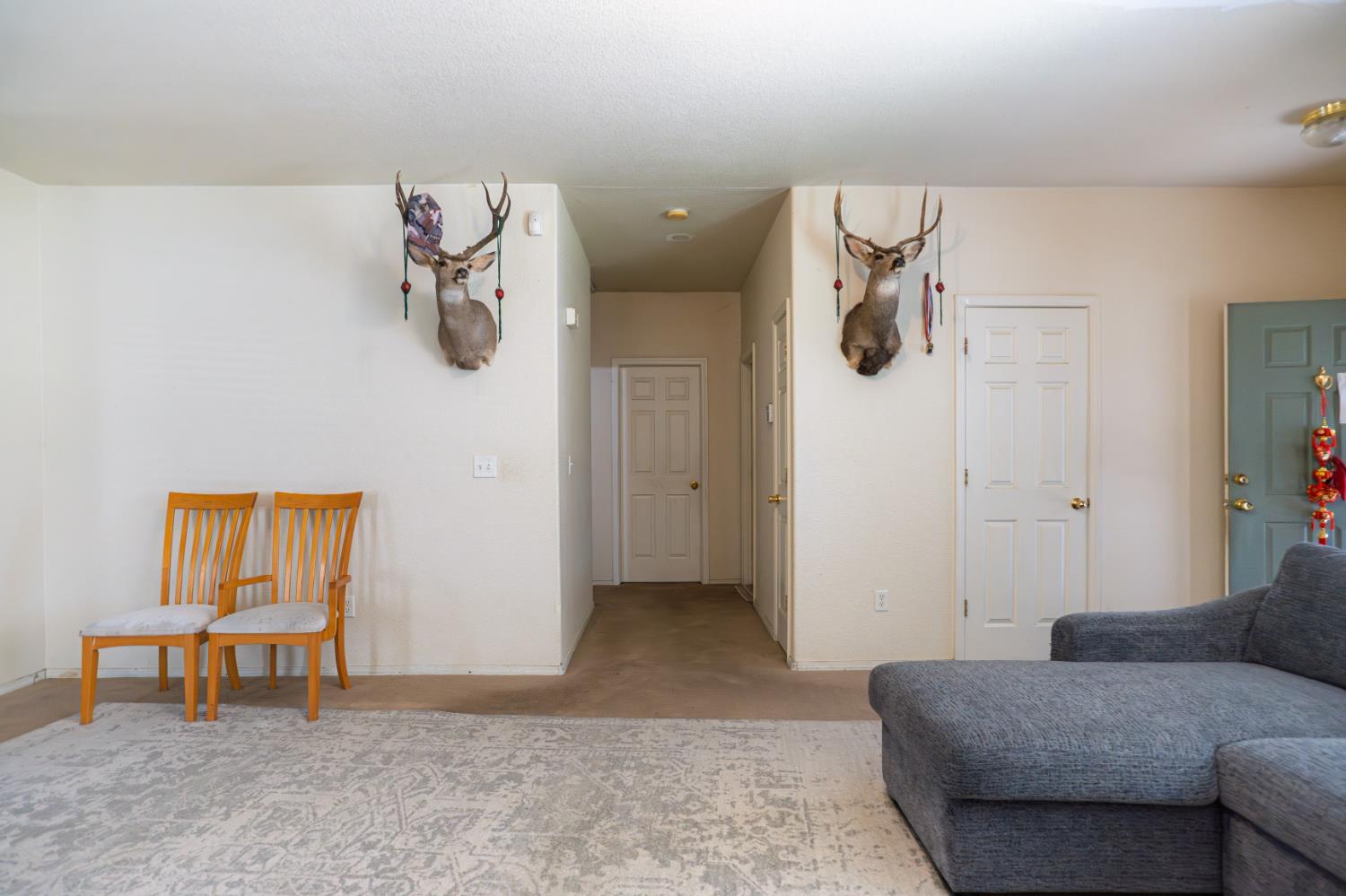 123 Manzanita Avenue Merced, CA 95341 - Photo 12 of 30 a living room with furniture and a window