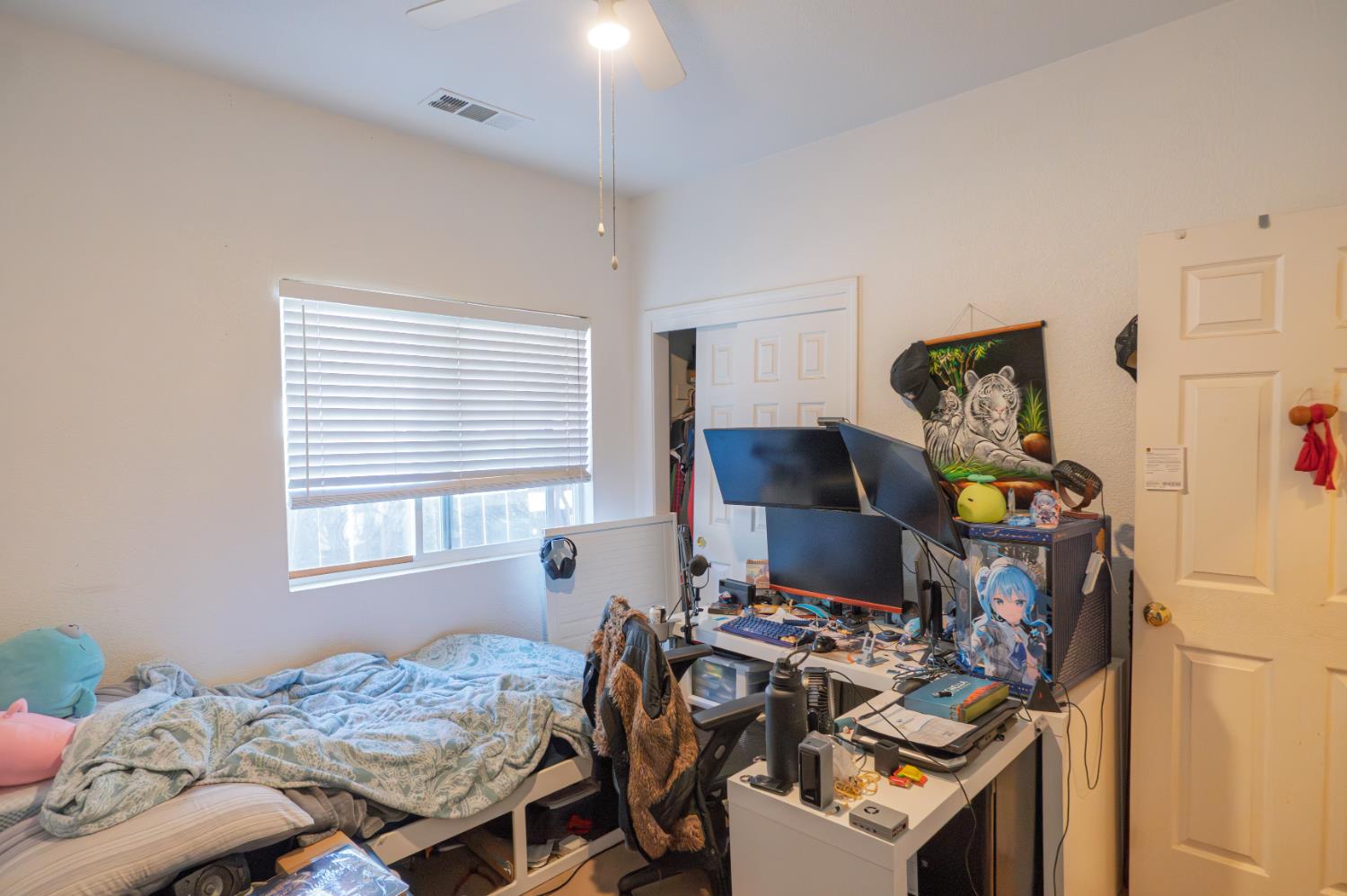 123 Manzanita Avenue Merced, CA 95341 - Photo 17 of 30 a view of a workspace with furniture