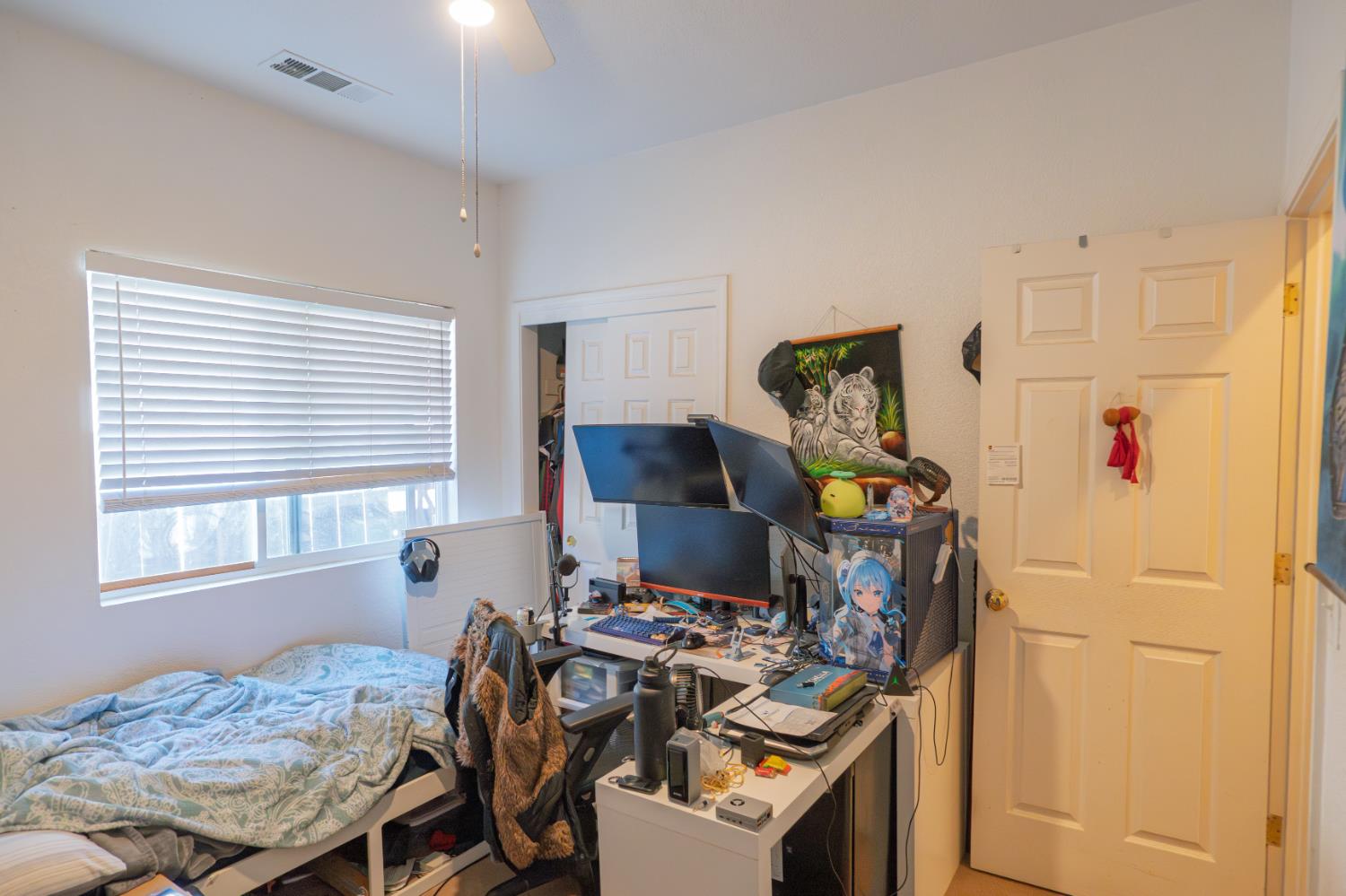 123 Manzanita Avenue Merced, CA 95341 - Photo 18 of 30 a view of a workspace with furniture