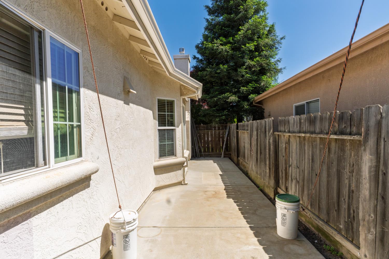 123 Manzanita Avenue Merced, CA 95341 - Photo 26 of 30 a view of a back yard of the house