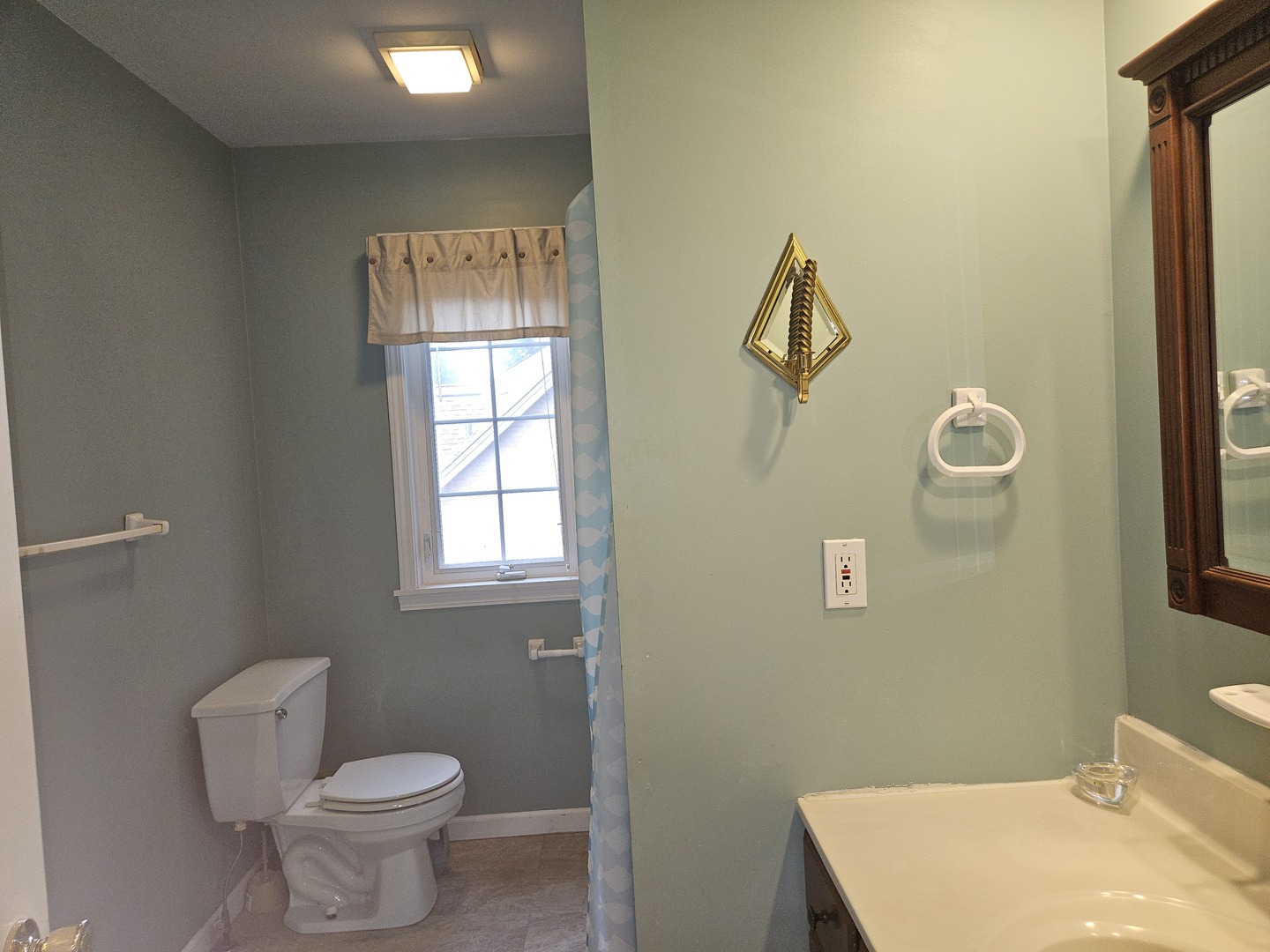 688 Fox Hollow Court DeKalb, IL 60115 - Photo 13 of 31 a bathroom with a toilet sink and mirror