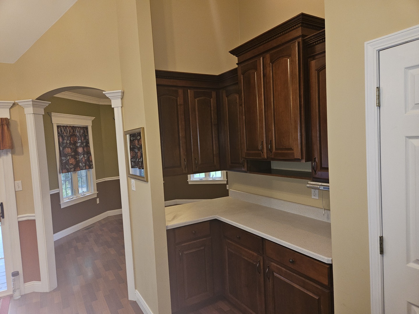 688 Fox Hollow Court DeKalb, IL 60115 - Photo 7 of 31 a kitchen with a sink and cabinets