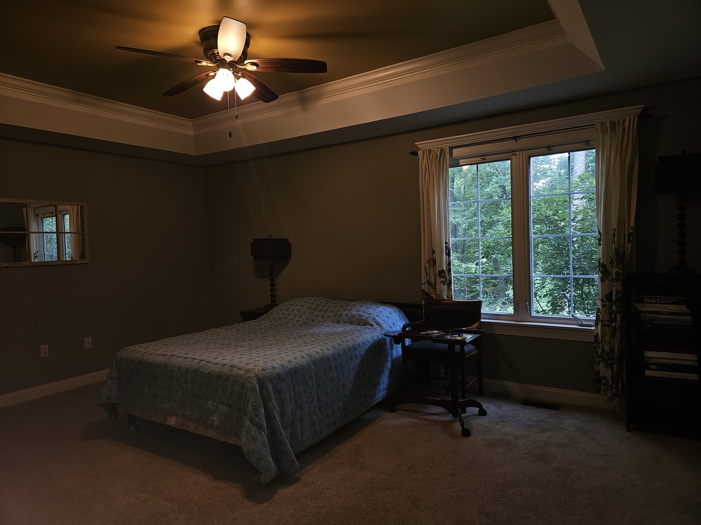 688 Fox Hollow Court DeKalb, IL 60115 - Photo 10 of 31 a bedroom with a bed and a chandelier