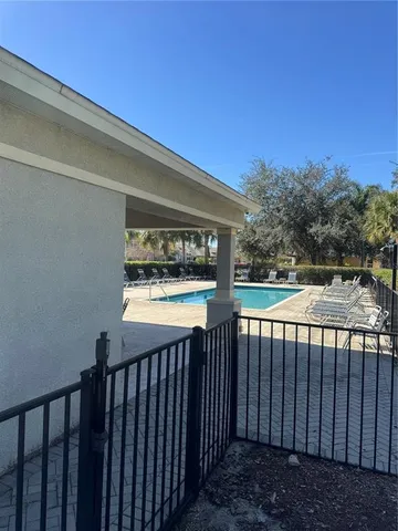 a view of a balcony with wooden floor and outdoor space
