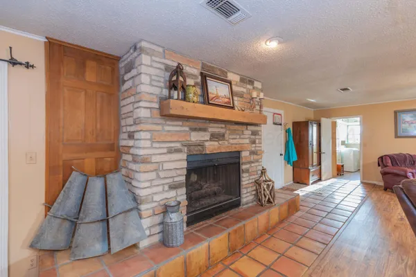 a bedroom with a bed and dresser
