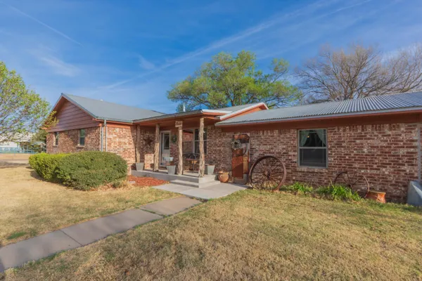front view of a house with a patio