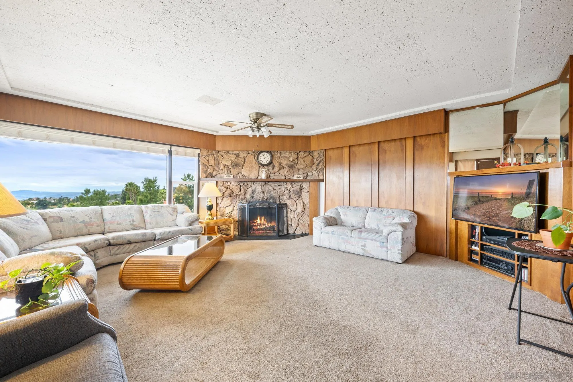 10407 Hawley Road El Cajon, CA 92021 - Photo 2 of 40 a living room with furniture and a flat screen tv