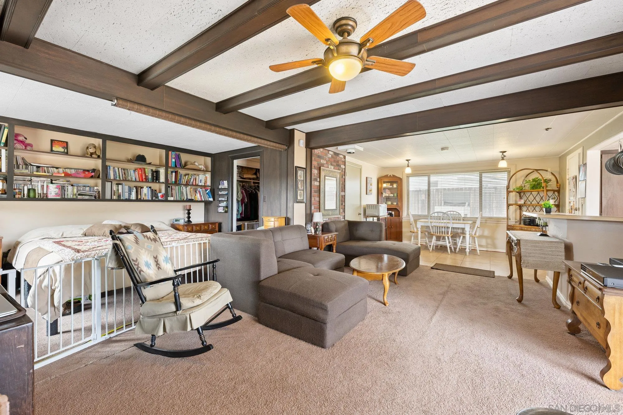 10407 Hawley Road El Cajon, CA 92021 - Photo 22 of 40 a living room with furniture and white walls