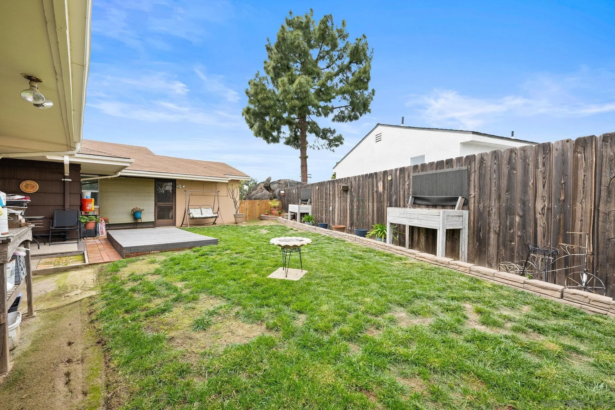 10407 Hawley Road El Cajon, CA 92021 - Photo 23 of 40 a house view with a sitting space and garden