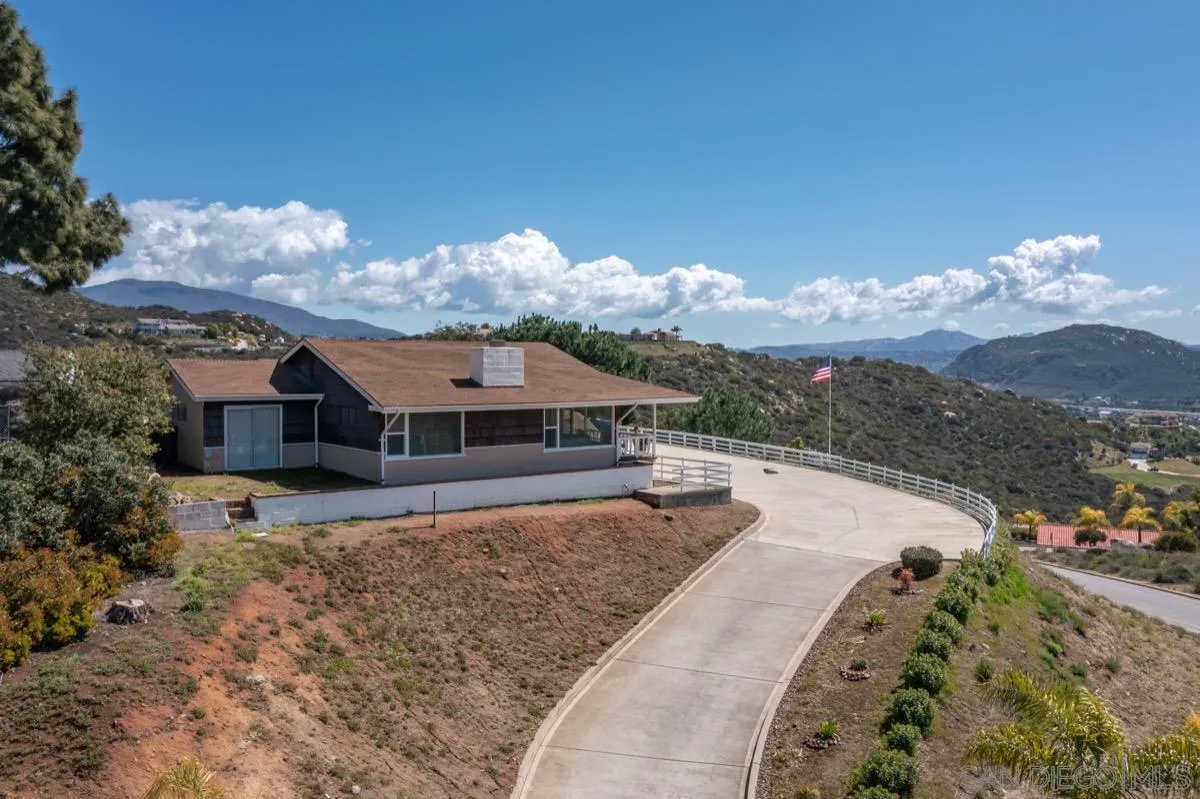 10407 Hawley Road El Cajon, CA 92021 - Photo 28 of 40 a view of a house with a yard