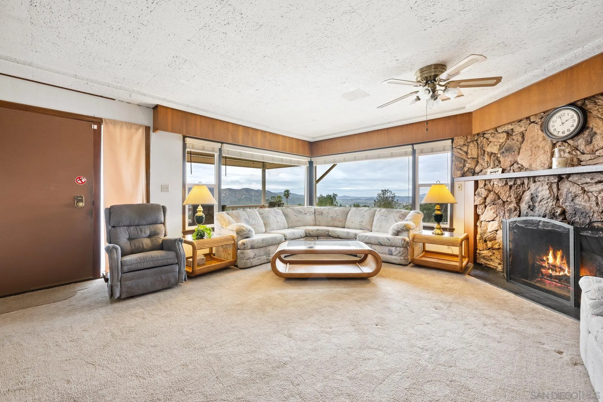 10407 Hawley Road El Cajon, CA 92021 - Photo 3 of 40 a living room with furniture and a fireplace