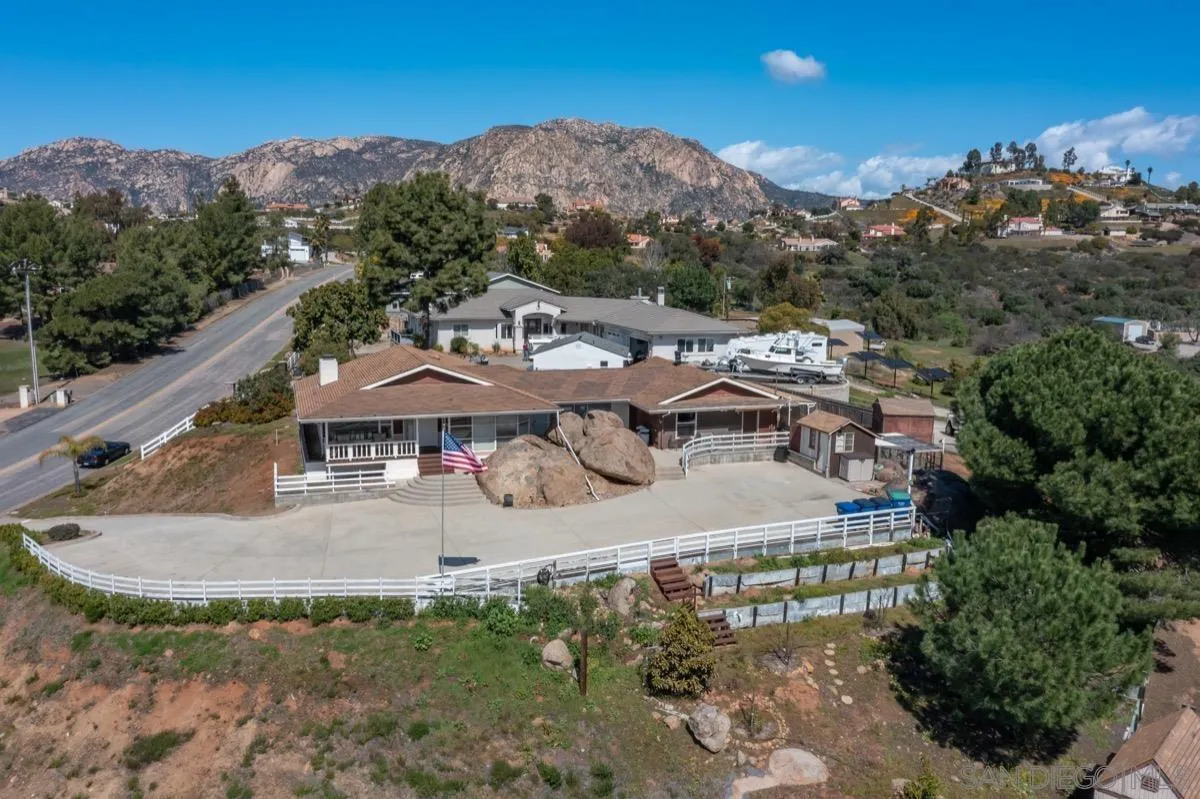 10407 Hawley Road El Cajon, CA 92021 - Photo 35 of 40 an aerial view of residential houses with outdoor space and trees