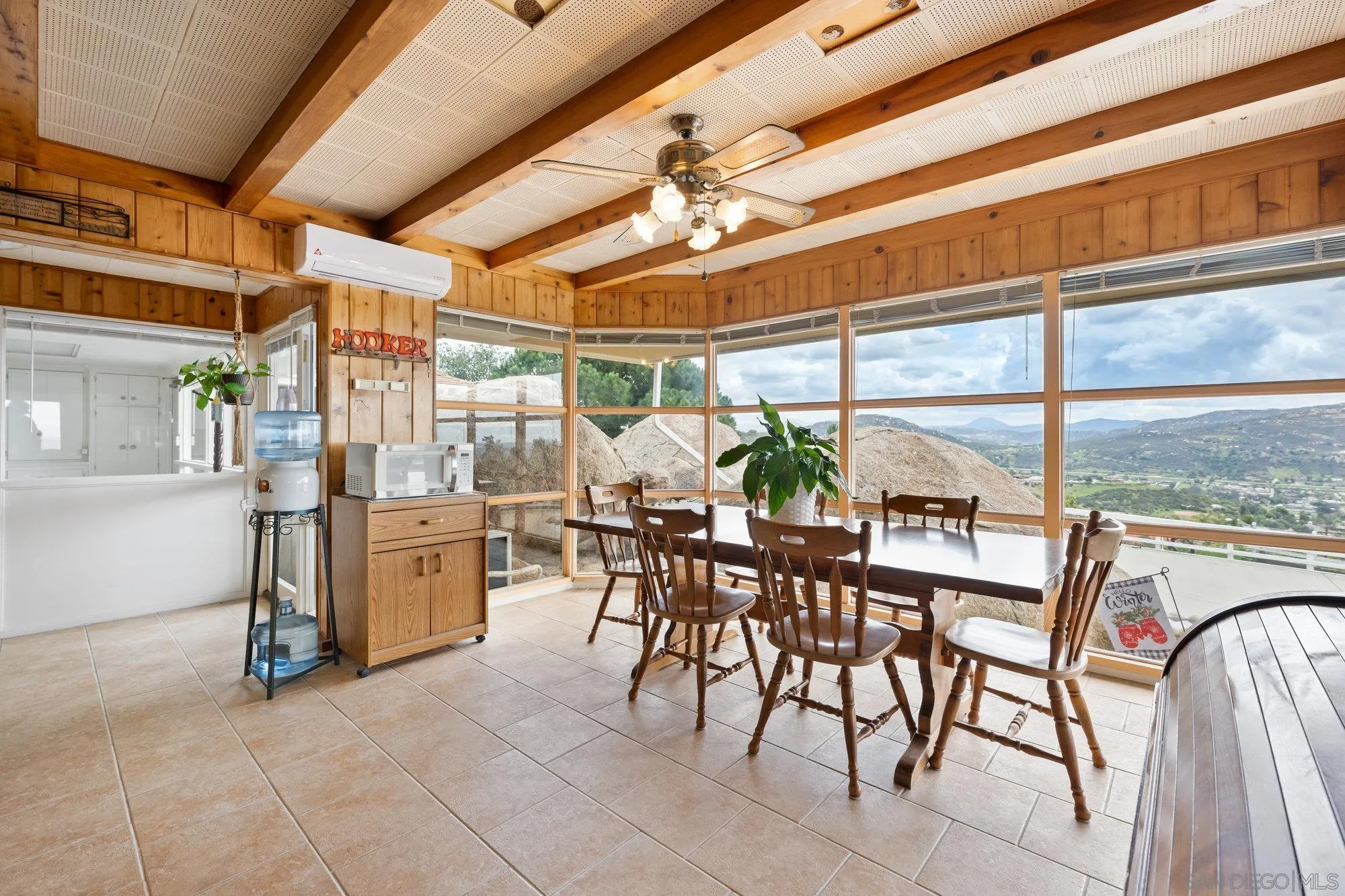 10407 Hawley Road El Cajon, CA 92021 - Photo 6 of 40 a view of a dining room with furniture window and outside view