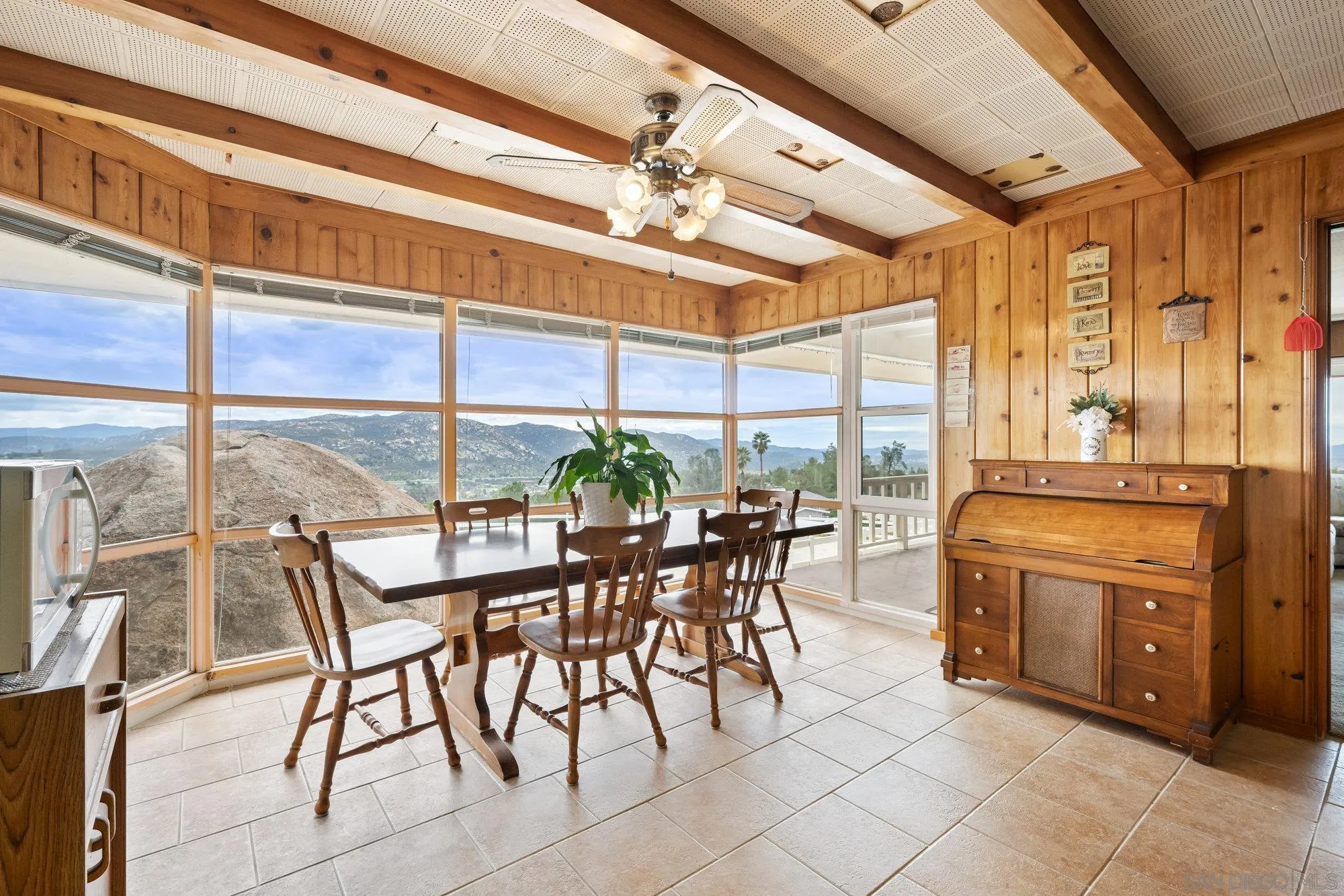 10407 Hawley Road El Cajon, CA 92021 - Photo 7 of 40 a view of a dining room with furniture window and outside view