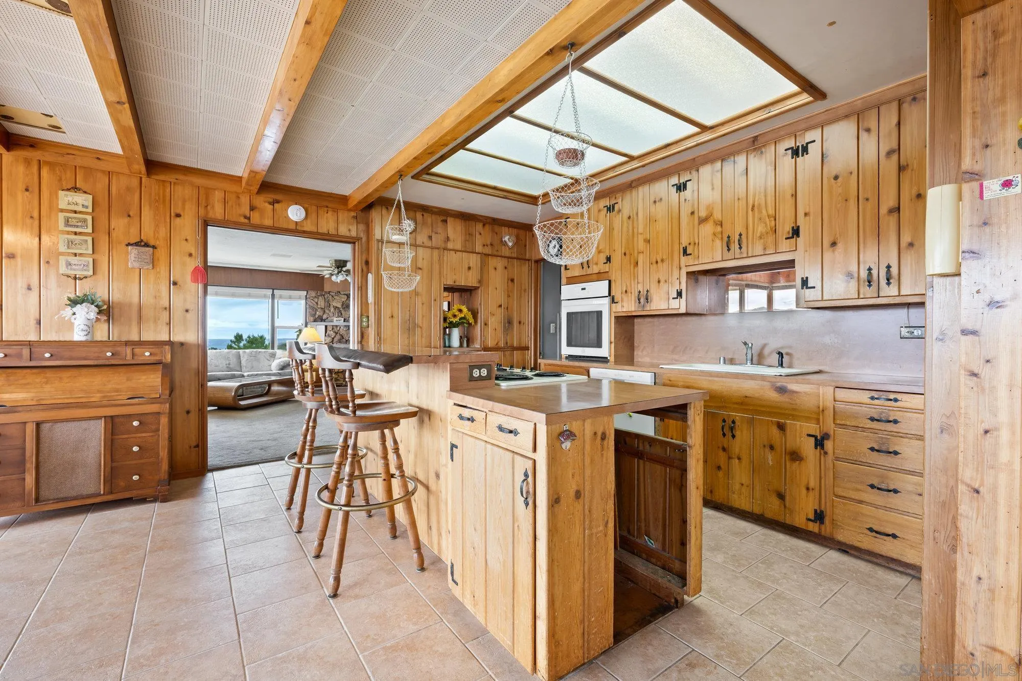 10407 Hawley Road El Cajon, CA 92021 - Photo 8 of 40 a large kitchen with a large window