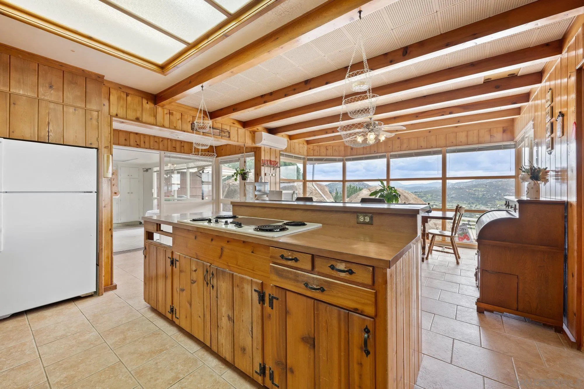 10407 Hawley Road El Cajon, CA 92021 - Photo 10 of 40 a kitchen with a stove and a refrigerator