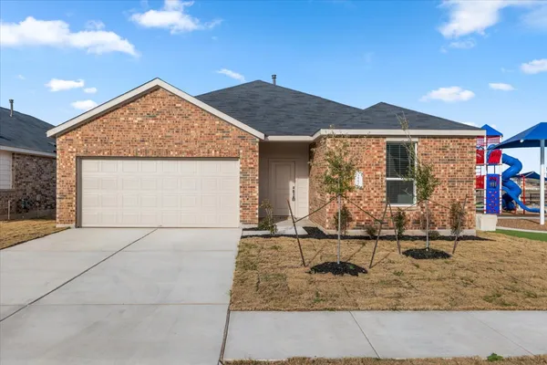 a view of a house with large windows