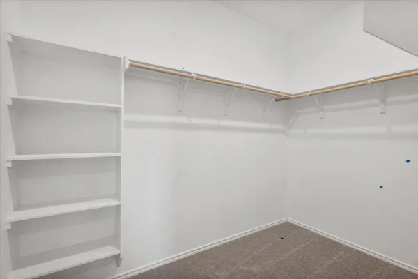 a bathroom with 2 sink and a mirror