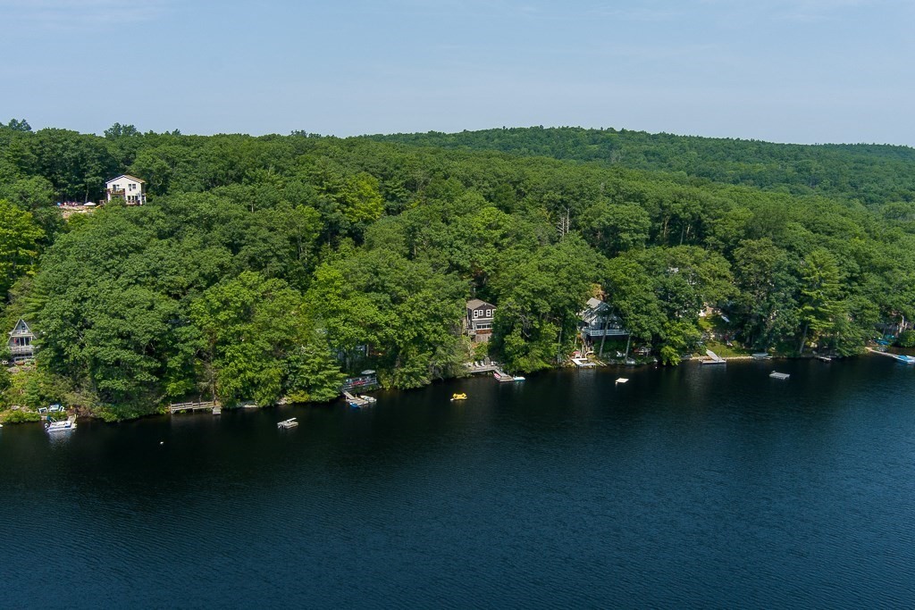 42 Goodrich Road Sturbridge, MA 01566 - Photo 23 of 36 a view of a city with lush green forest
